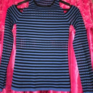 Long sleeved cold shoulder fitted top